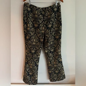 Pantalones Urban Outfitters estampados negros y dorados - Imagen 1 de 3