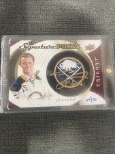2015-16 Upper Deck Trilogy Signature Pucks Gold Ink #SP-JE Jack Eichel #07 of 16