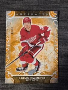 2024-25 Upper Deck Artifacts Orange - Lucas Raymond /65 Detroit Red Wings  - Bild 1 von 2
