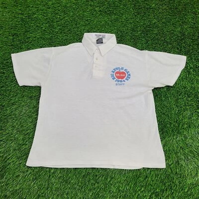 Vintage 1984 Big-Apple-Games Staff Polo Shirt M/L 21x24 White Cropped NYC - image 1 of 4