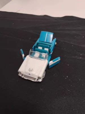 Road Champs 1955 Oldsmobile Starfire Convertible Diecast Car/Moving... - Image 1 of 4