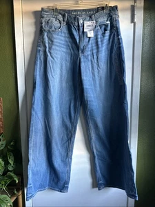 Pantalones de mezclilla para mujer American Eagle Dreamy drapeados elásticos holgados pierna ancha talla 10 regular 30 W - Imagen 1 de 12