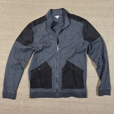 Chaqueta Calvin Klein Hombre Cremallera Gris Medio Con Bolsillos [M333] Foto 1 de 4