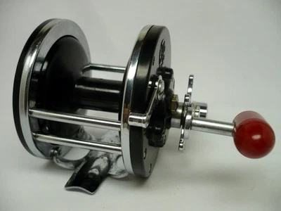 Carrete de pesca convencional de agua salada Penn Long Beach 60 de colección mango rojo limpio Foto 1 de 4