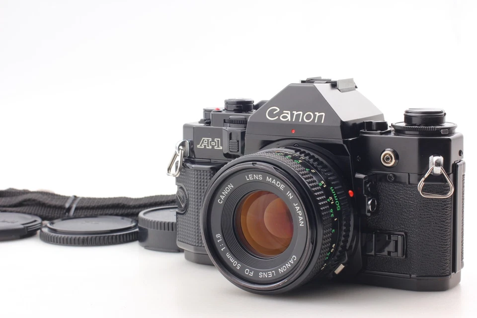 [Casi COMO NUEVO con tapa de correa] Cámara fotográfica Canon A-1 A1 35 mm + Lente NFD 50 mm F1,8 JAPÓN Foto 1 de 4
