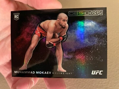MUHAMMAD MOKAEV 2023  Panini UFC Obsidian Black Color Blast Flyweight - Image 1 of 3