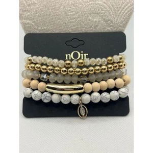 Juego de pulsera apilable con cuentas multicolor nOir Jewelry elástico marfil oro O29 - Imagen 1 de 5