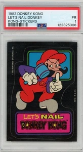 1982 Topps Nintendo Donky Kong Pegatina Let's Nail Donkey Kong PSA 1 POP 1 - Imagen 1 de 2