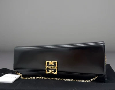 AUTÉNTICO NUEVO CON ETIQUETAS $1750 Bolso sin asas largo de piel de becerro con logotipo líquido Givenchy 4G - Negro Foto 1 de 4
