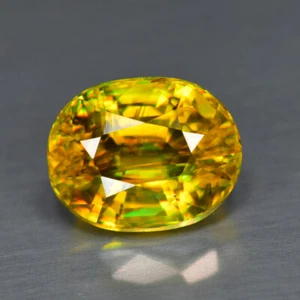2.25Ct Master Oval Cut_Superior Unheated Yellow With Multi Color Titanite Sphene - Picture 1 of 1