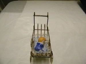 VINTAGE METAL BABY CARRIAGE CERAMIC SLEEPING BABY FIGURINE DOLLHOUSE FURNITURE - Picture 1 of 11