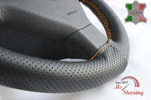 ¿Se adapta a International 9400i? - CUBIERTA DE VOLANTE DE CUERO PERFECTO NEGRA PUNTA NARANJA - Imagen 1 de 6