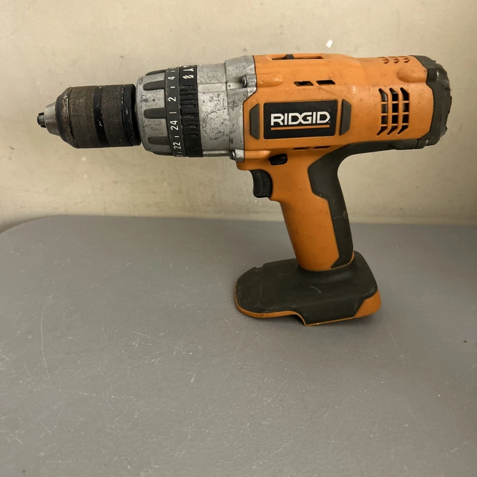 Taladro percutor inalámbrico con batería RIDGID 24V 2 velocidades - Solo taladro Foto 1 de 4