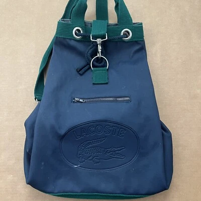 Bolso de Lona Lacoste Mochila Bolso Grande Azul Verde Parte Superior y Carga Lateral Pies de Metal Foto 1 de 4