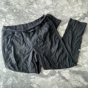 Lululemon Mid-Rise Stretchy Ankle Cropped Pants Black 10 - Picture 1 of 8
