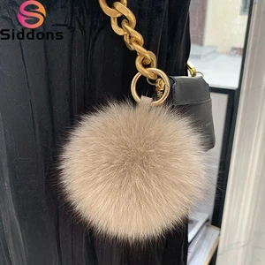Llavero bolso colgante de piel de zorro real 2025 para mujer elegante bola mullida coche llavero pompones - Imagen 1 de 43