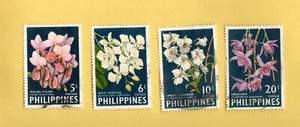 PHILLIPPINES USED FLOWERS 4 POSTAGE STAMPS - Picture 1 of 1