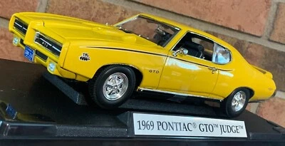1969 Pontiac GTO Judge Yellow 1:18 Diecast Model Car  BRAND NEW  - Image 1 of 4