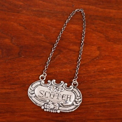 ETIQUETA BOTELLA AMERICANA PLATA ESTERLINA "SCOCÉS" PERGAMINO, UVA Y VID SIN MONO Foto 1 de 4