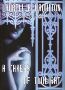 A Caress of Twilight (Meredith Gentry Novels)-Laurell K. Hamilton - Picture 1 of 1