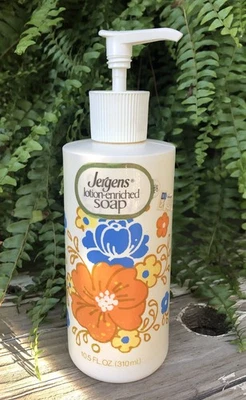 Botella de plástico bomba de jabón de manos Jergens VACÍA de colección naranja azul flores años 80 utilería Foto 1 de 4