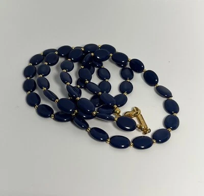 Napier Blue plastic beads separated by gold beads necklace 30 inches long - Image 1 of 3