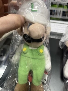 "Juguete de peluche Super Mario Bros 10"" Fire Luigi 2022 nuevo con etiquetas" - Imagen 1 de 2