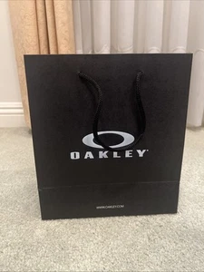 OAKLEY GESCHENK/EINKAUFSTASCHE PAPIER GRAU/WEISS LEER 10" X 9" X 4,5" - Bild 1 von 7