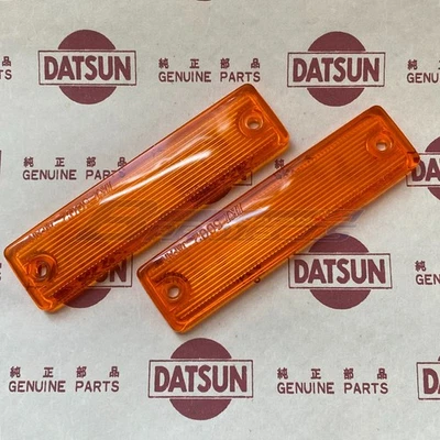 Lente ámbar intermitente lateral Datsun 1200 genuina (se adapta a Nissan B110 B120 Sunny Truck) Foto 1 de 4