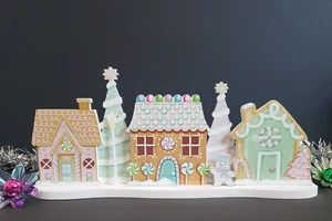 New Gingerbread Style Houses On A Wood Christmas Sign in Pastel Colors - Picture 1 of 4