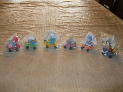 Juego de 6 figuras de pvc smurf Hardee's 1990 skate como nuevas en bolsa - Aplausos Foto 1 de 2