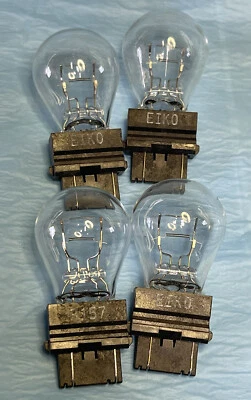EIKO 3157 Certified Green Clear Tail Light Bulbs   QTY OF 4 BULBS (23M3) - Image 1 of 3