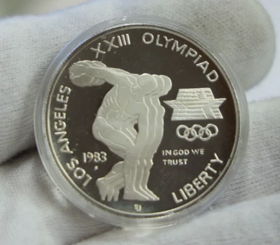 1983 S US Proof Olympic Commemorative Silver $1 - Image 1 of 2