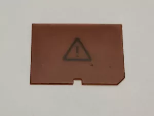 Genuine BMW E30 Instrument cluster component. Triangle symbol lens - Picture 1 of 2