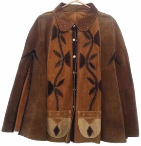 Poncho mantello vintage anni 70 in pelle scamosciata con applicazioni floreali marrone/ocra traforato - Foto 1 di 7