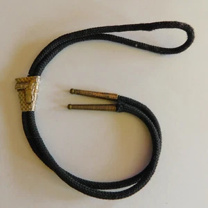 VINTAGE BOLO TIE PEWTER- GUN IN HOLSTER- MEDALLION CLOTH STRING TIE - Picture 1 of 5