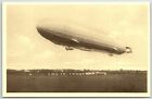 Postcard Marine Luftschiff German Dirigible Zeppelin Ascending from Field