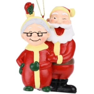 Adorno de Navidad besándose Papá Noel y la señora Claus bajo el muérdago de los árboles - Imagen 1 de 6