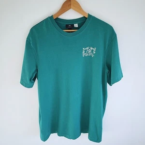 T-shirt Keith Haring x H&M M verde uomo vestibilità rilassata bianca grafica manica corta - Foto 1 di 10