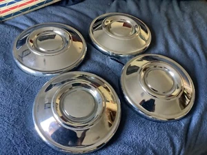 Datsun 620 pickup hubcap set. nos - Picture 1 of 10