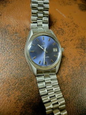 Reloj Omega 166.067? Cal. 565. Automático, fecha, esfera azul Foto 1 de 4