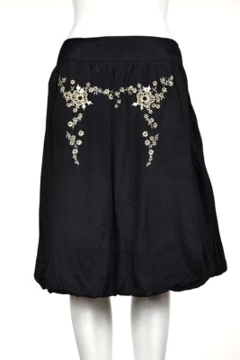 Falda para mujer Nicole Nicole Miller talla 10 negra dorada línea A floral informal rodilla Foto 1 de 4