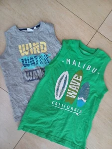 2 ärmellos Shirts Tanktops surfboard wendepailletten 146 152 - Bild 1 von 6