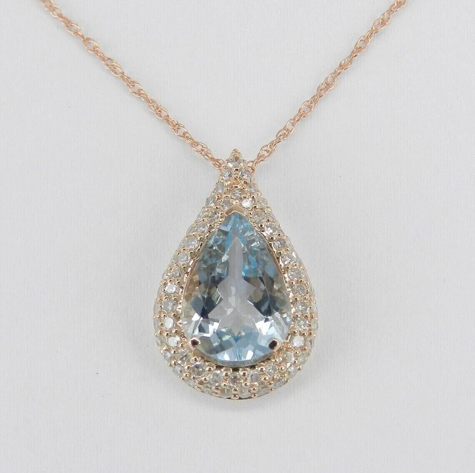 Colgante lágrima aguamarina simulada corte pera de 1,50 quilates chapado en oro amarillo de 14 quilates Foto 1 de 3