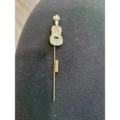 Broche instrumento guitarra gemas y oro Foto 1 de 3