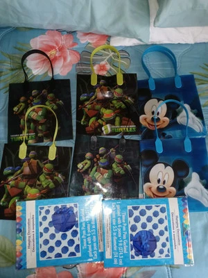 8 pcs Disney TMNT Party Favors Loot Birthday Bags + 2 Blue Tissue PomPom Garland - Image 1 of 4