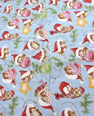 Blue David Textiles Santa Hat Kitten Cat in Stocking Christmas Fabric 1 Yd - Image 1 of 4