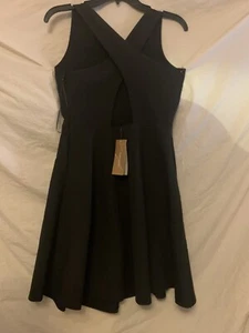  Francesca Skaterkleid hinten überkreuzte Taschen versteckter Reißverschluss schwarz Größe M - Bild 1 von 11