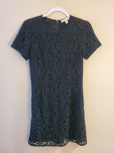 Abito Michael Kors nero in pizzo aderente e svasato con tasche taglia 2