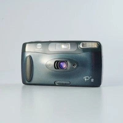 EXCELENTE CÂMERA DE FILME MINOLTA P's Panorama 24mm F/4.5 Point & Shoot - Imagem 1 de 4